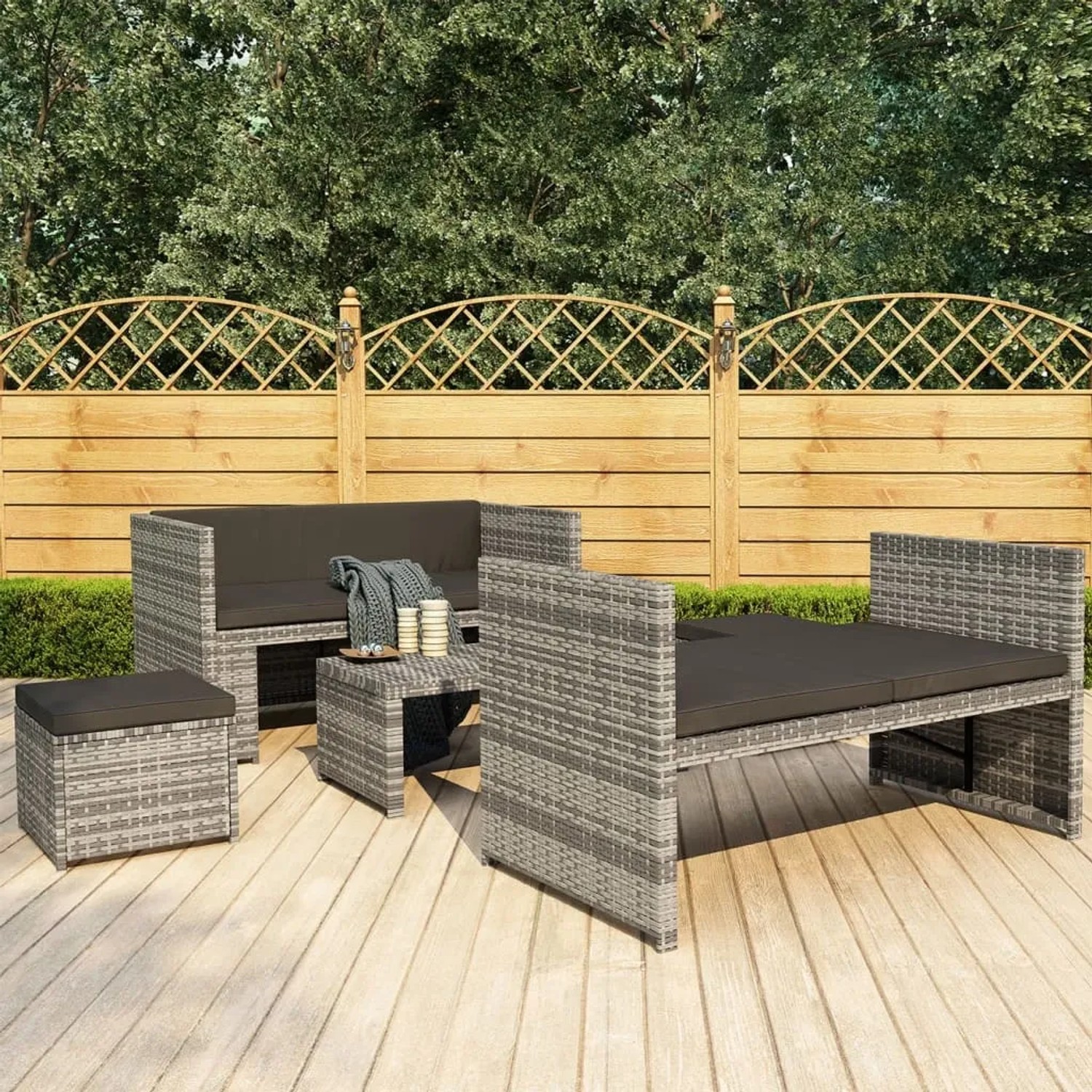 Graues 5-tlg. Garten Lounge Set mit Auflagen aus Poly Rattan. Gartenmöbel für entspannte Stunden im Freien.