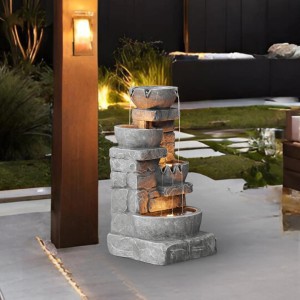 Grauer Teamson Home Gartenbrunnen mit Kaskaden, Schalen, gestapelten Steinen und LED-Beleuchtung.