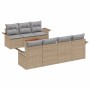 Beiges 8-teiliges Garten-Sofa-Set aus Poly Rattan mit Tisch und grauen Kissen.