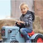 Kind auf blauem BIG Traktor Eicher Diesel ED 16 Trettraktor mit Kettenantrieb.