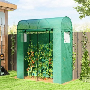 Grünes Furnicato Tomatengewächshaus mit Rolltor und Netzfenstern im Garten.