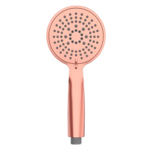 Rosegoldener Duschkopf Young, 11 cm Durchmesser, aus Kunststoff mit Noppen zur Kalkreinigung.