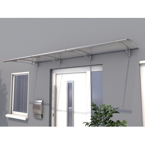 Modernes Pultvordach aus Edelstahl mit klarer Acrylglasabdeckung für den Hauseingang.