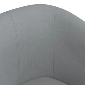 Detailaufnahme Clubsessel mit Fußhocker, hellgrauer Stoffbezug.