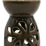 Braune Keramik Duftlampe mit elegantem, durchbrochenem Muster. Ideal als Aromalampe und Kerzenhalter für Teelichter.