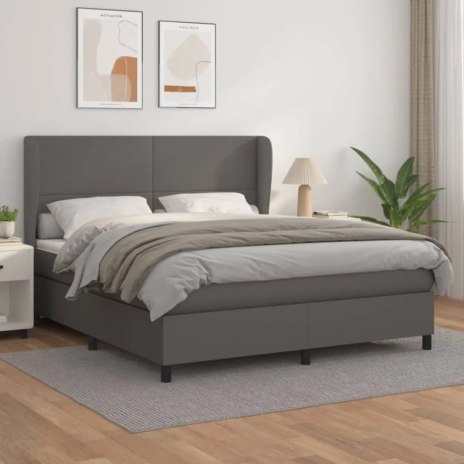 Graues vidaXL Boxspringbett (180x200 cm) mit Matratze und Kunstleder-Bezug.