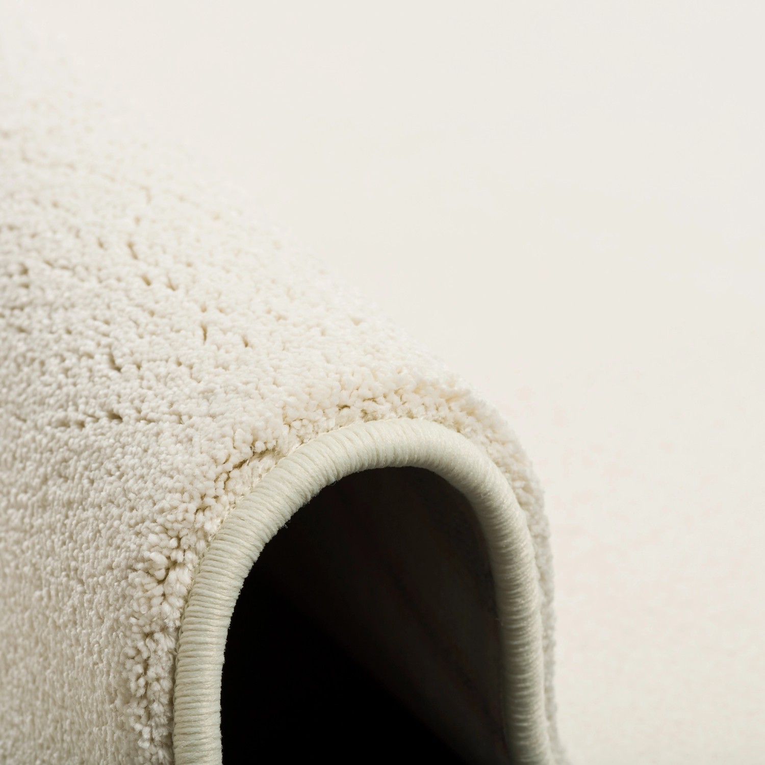 Detailansicht: Creme Snapstyle Hochflor Teppich (200x300cm) mit weichem Flor.