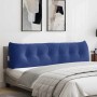 Polizeiblaues Samt-Rückenkissen mit Knopfdesign und Seitentasche auf einem Bett. Bietet Komfort und Rückenstütze.