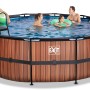 Runder EXIT Wood Pool Ø450x122cm in Braun mit Filterpumpe und Poolleiter, Personen im Wasser.