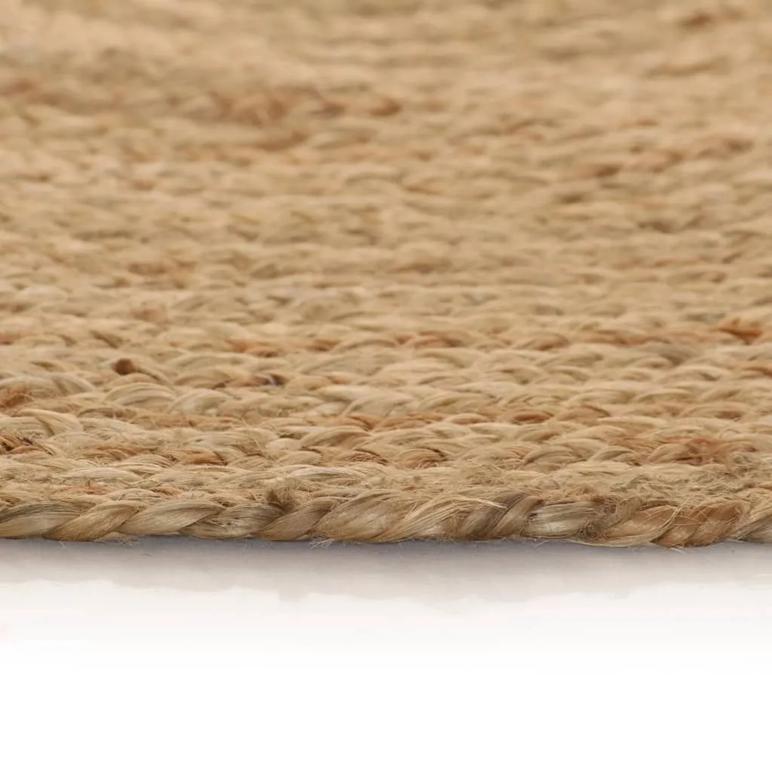 Geflochtener runder Juteteppich in Natur, 150 cm Durchmesser. Detailansicht der robusten Textur.
