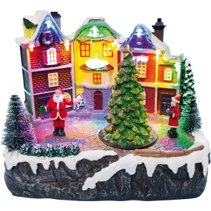 Beleuchtetes Weihnachtsdorf mit bunten Häusern, Tannenbaum, Santa Claus und Figur. Mehrfarbige Kunststoff-Weihnachtsdekoration.