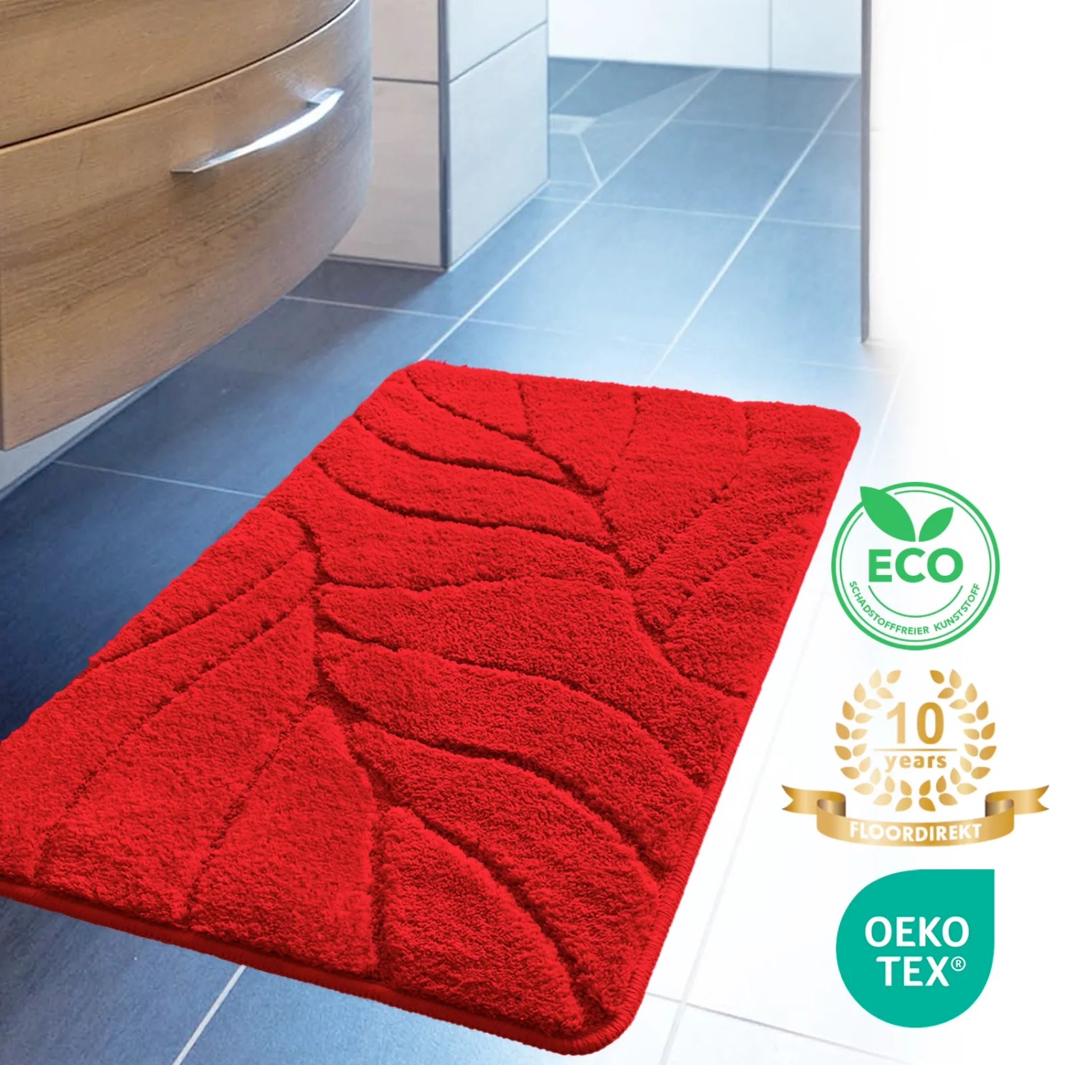 Rote Karat Badematte Maris 60x120 cm mit Blattstruktur im Badezimmer.