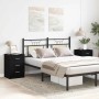 Zwei schwarze Nachttische aus Holzwerkstoff neben einem Bett mit schwarzem Metallgestell.
