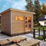 Karibu Saunahaus Hendrik 2 mit Ofen und externer Steuerung auf Terrasse. Holzhaus für Wellness im Garten.