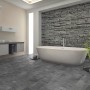 Badezimmer mit Classen Ceramin Fliese Neo Vario Repello in dunkler Steinoptik als Bodenfliese.