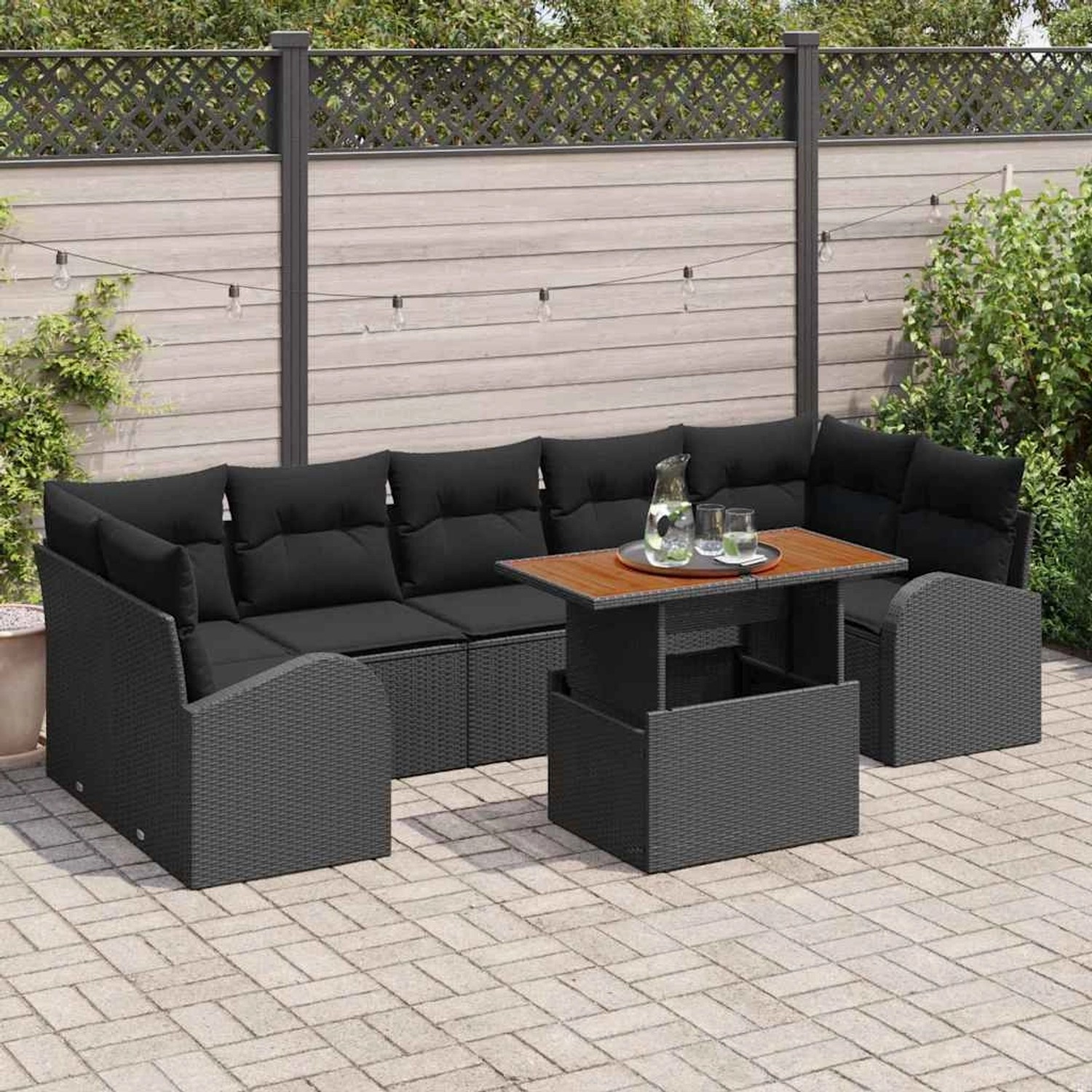 Schwarzes 8-tlg. vidaXL Garten-Sofa-Set aus Poly Rattan mit Tisch und Stauraum.