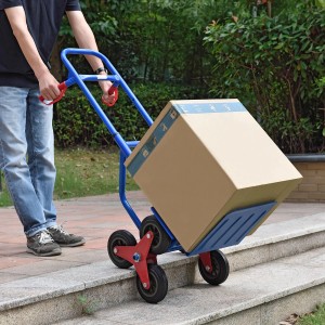 Juskys Treppensackkarre mit Karton auf Treppe, max. 100 kg Traglast.