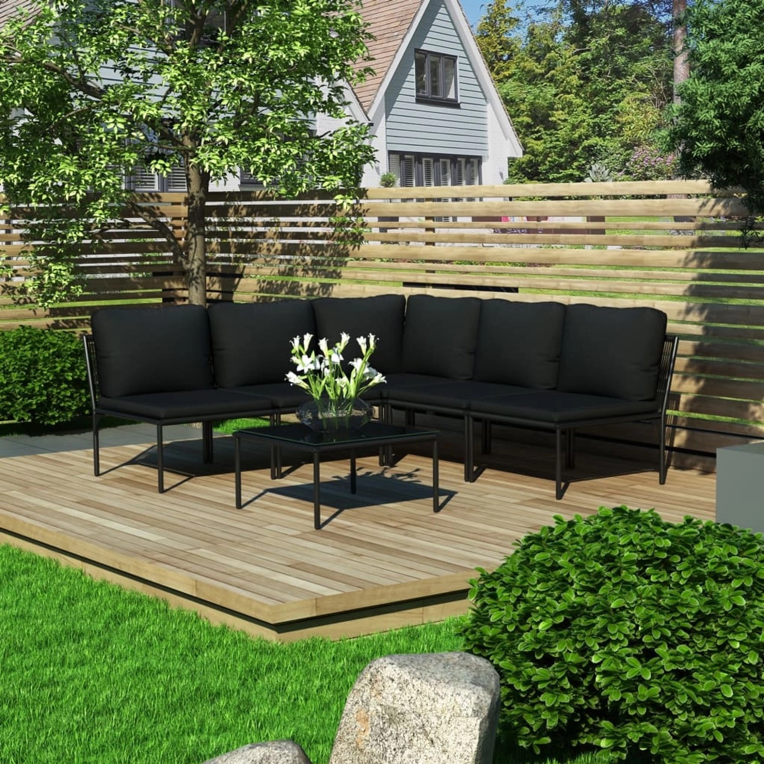 Schwarzes 6-tlg. vidaXL Garten-Lounge-Set mit Auflagen auf einer Holzterrasse. Inklusive Tisch und Kissen.