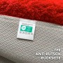 Rote Karat Badematte Maris, Rückseite mit Anti-Rutsch-Beschichtung und Pflegehinweis-Etikett.