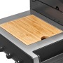 Detailaufnahme: Enders Gasgrill Uniq 4 IK Cruster mit Bambus-Schneidebrett und GN-Behälter.