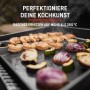 Weber Gasgrill Slate GPD Premium Plancha 71 cm: Grillplatte mit Garnelen und Gemüse.