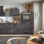 Moderne pino Küchenzeile in Beton Grafitgrau mit E-Geräten und Seitenschrank.