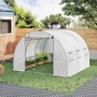 Weißes WOLTU Gewächshaus mit offener Tür, 6 Fenstern und Pflanzen im Garten. Winterfester Folientunnel für Anbau.