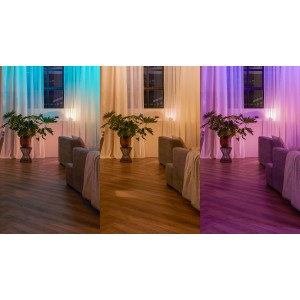 Philips Hue Wandschalter Modul in Weiß zeigt verschiedene Lichtszenen im Wohnraum.