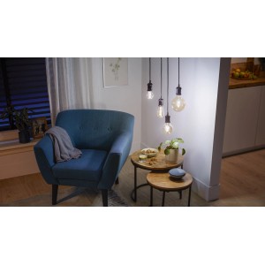 Philips Smart LED-Filament Leuchtmittel E27 Edison, warmweißes Licht im Wohnraum.