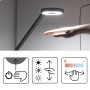 Schwarze Luctra LED Schreibtischlampe mit Gestensteuerung und Bedienungsanleitung.