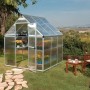 CANOPIA Gewächshaus 3,4 m² mit Fundamentrahmen im Garten, Tür geöffnet, mit Pflanzen.