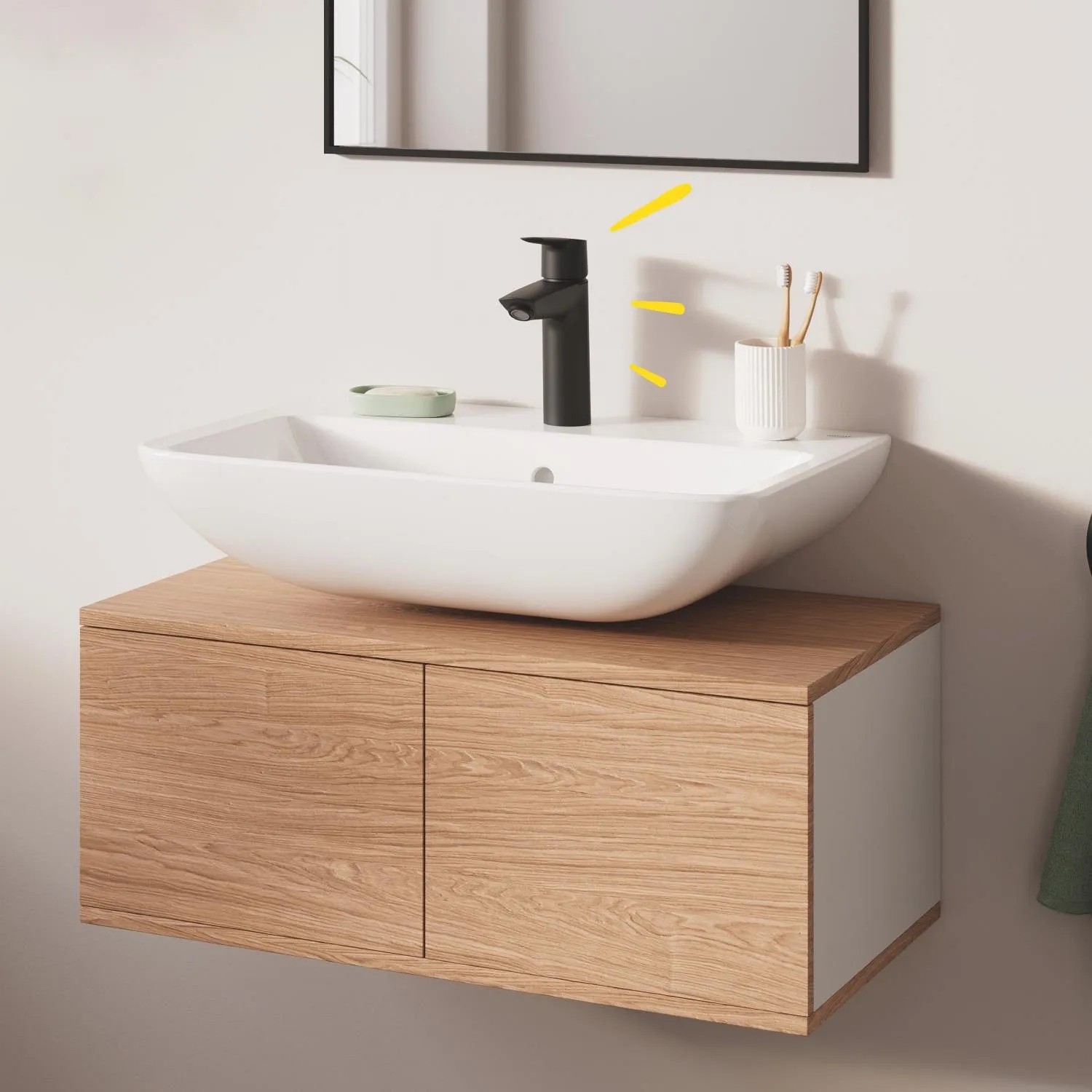 Grohe QuickFix Waschtischarmatur Start M Schwarz auf Aufsatzwaschbecken im Bad.