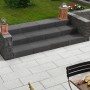 Anthrazitfarbene Blockstufe aus Beton, 50x34x15 cm, für Gartentreppen.
