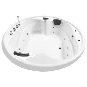 Runde, weiße Basera® Indoor Podest-Whirlpool Badewanne Gomera mit Armatur und Kopfstützen.
