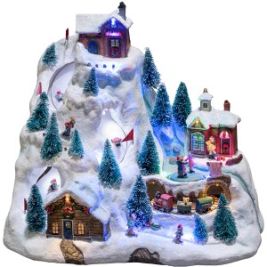 Konstsmide LED-Szenerie Skipiste: Winterliche Miniatur-Weihnachtswelt mit Häusern, Skifahrern und Zug.