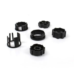 Somfy Adapterset Deprat 53 für 50mm Motoren, verschiedene Adapter aus schwarzem Kunststoff.