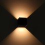 Schwarze, eckige LED Außenwandleuchte mit warmweißem Lichtstrahl nach oben und unten.