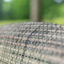 Detailaufnahme des Acamp Gartenmöbel-Sets Maui: Geflecht in Bambus-Optik.