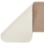 Beige rechteckige Antirutsch Stufenmatte, umgeklappt zeigt die helle, rutschfeste Latex-Unterseite.