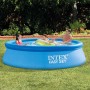 Blauer Intex Easy Set Pool (Ø 305 cm) mit Familie im Garten. Quick-Up Pool für Badespaß.