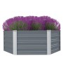 Graues sechseckiges vidaXL Hochbeet aus verzinktem Stahl, gefüllt mit lila Blumen. Ideal für Garten und Pflanzen.