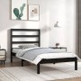Schwarzes Massivholzbett 100x200 cm mit Lattenrost und Kopfteil im Schlafzimmer.