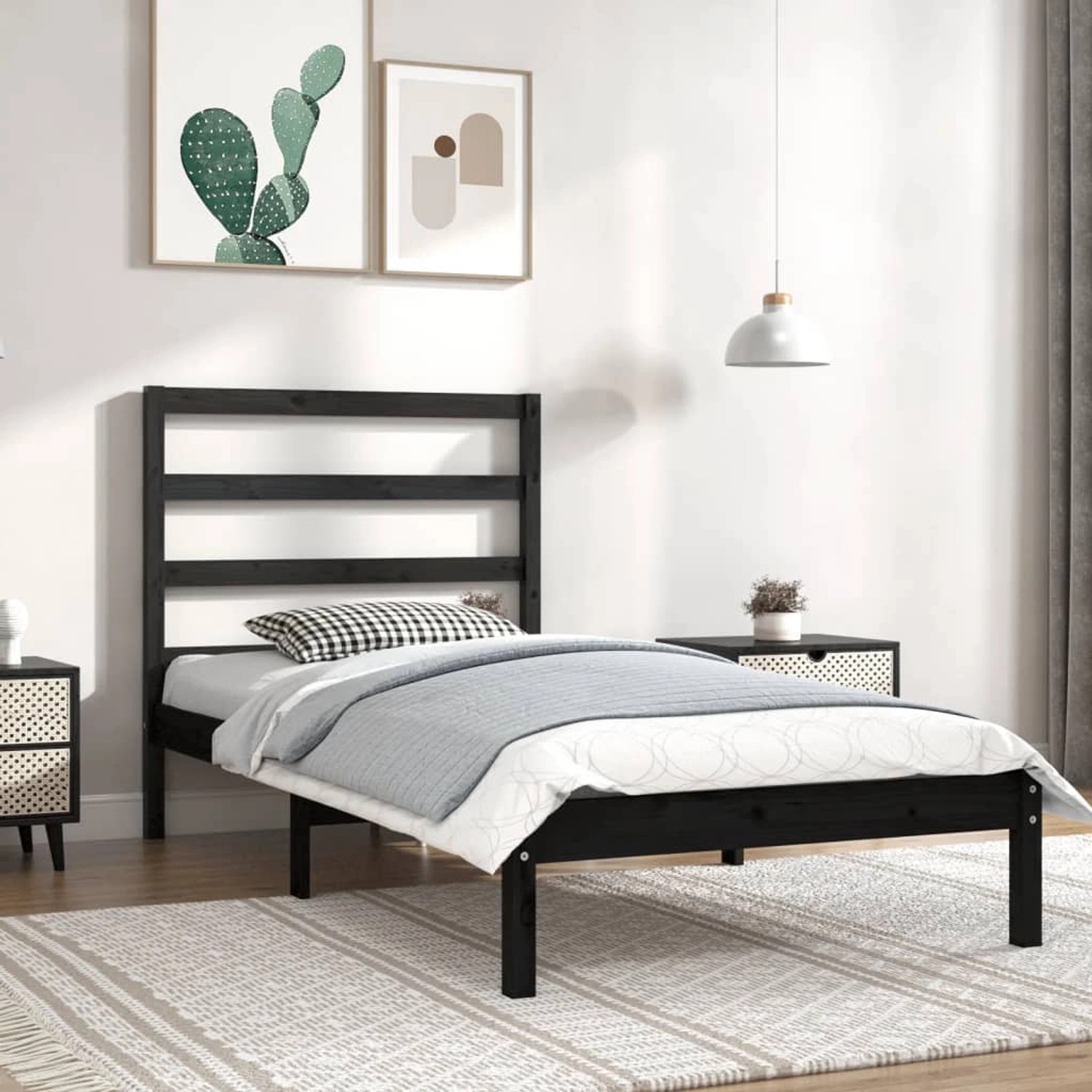 Schwarzes Massivholzbett 100x200 cm mit Lattenrost und Kopfteil im Schlafzimmer.