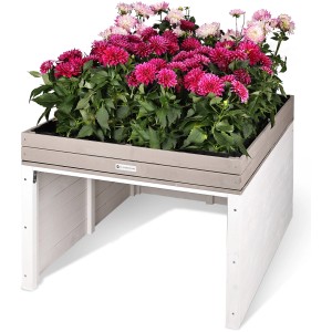 WONDERMAKE Mährobotergarage Cubilio1 mit Pflanzkasten, Fichte, weiß-grau, bepflanzt mit pinken Dahlien.