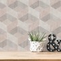 Vliestapete mit 3D-Effekt, geometrischem Muster, Glitzer und leichter Struktur in Beige und Creme.