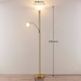 Goldene Lindby Stehlampe Jost mit zwei Leuchten, ideal als Wohnzimmerleuchte.