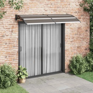 Schwarzes vidaXL Vordach 240x100 cm aus Polycarbonat über einer Schiebetür.