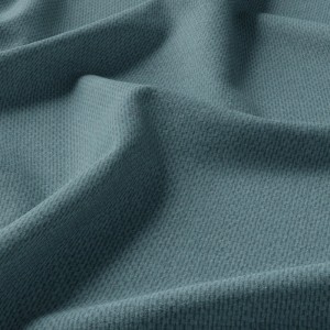 Nahaufnahme des hellblauen Bricoflor Verdunkelungsvorhangs Galdin mit Textur.