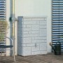Arves Regentonne Maurano 300 l in Granit-Optik mit Wasserhahn vor Hauswand.