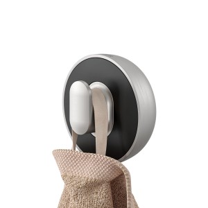 Tiger Cooper Handtuchhaken, groß, Edelstahl/Schwarz mit Handtuch.